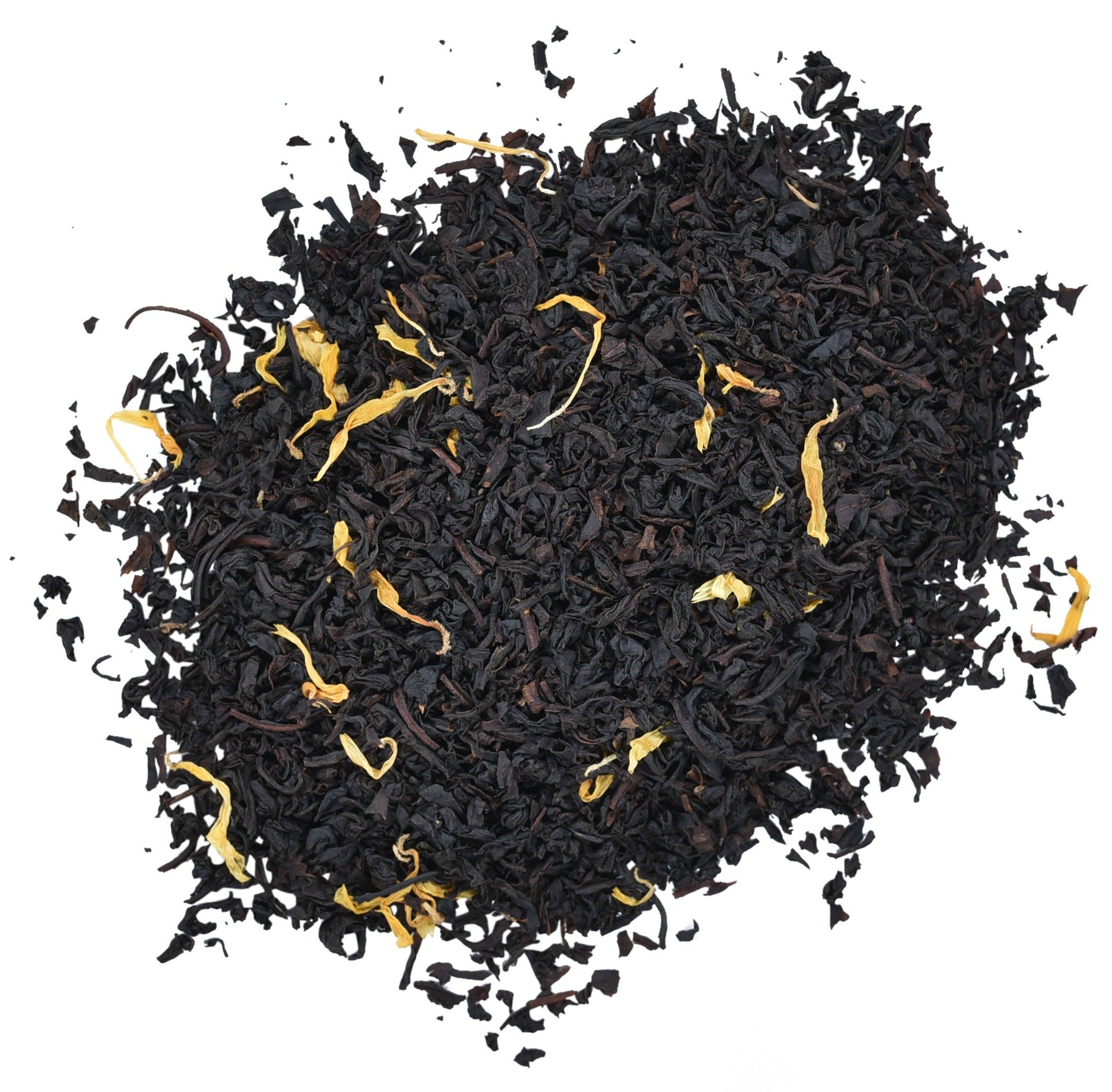 Loose leaf dark black tea sprinkled with golden yellow marigold petals.