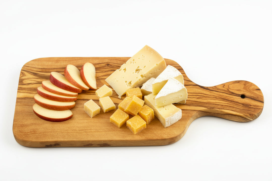 Wooden cutting board with handle on a white background