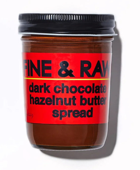 A jar of Fine &amp; Raw dark chocolate hazelnut butter spread on a clean white background with a soft shadow.