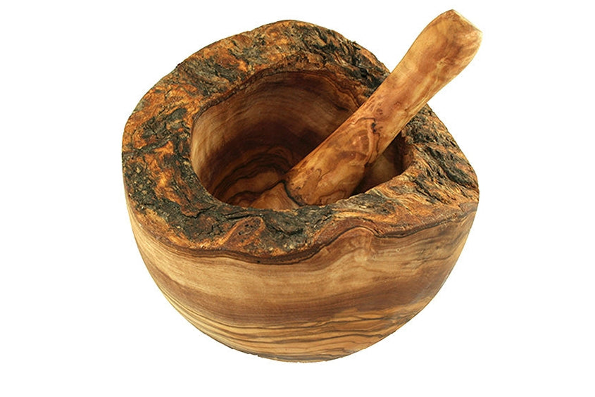 Wooden mortar and pestle on a white background
